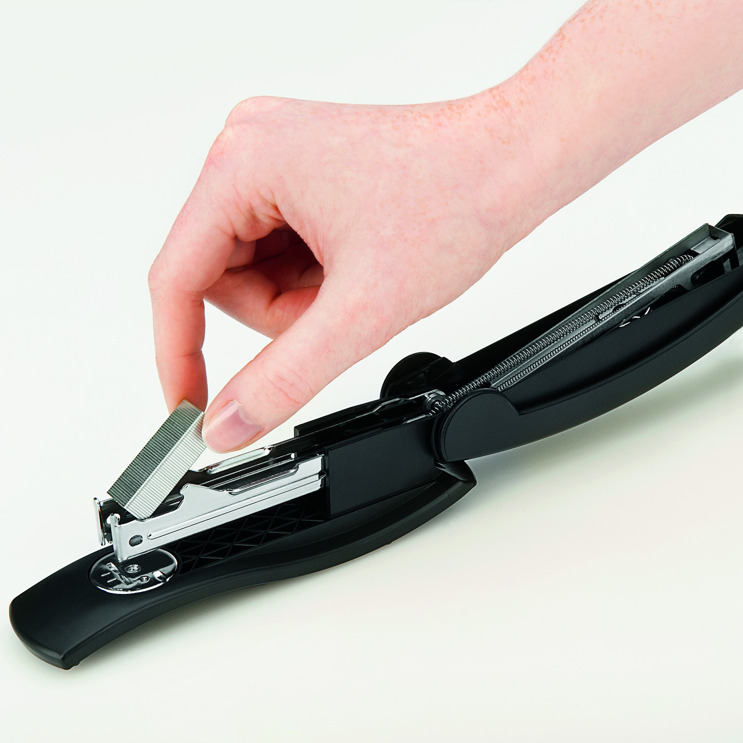 After tipping up the top of the stapler the staples can be inserted into the magazine.